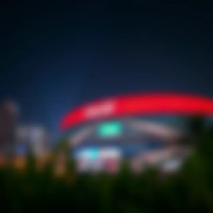 Coca-Cola Arena illuminated at night, enhancing Dubai's skyline