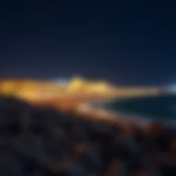 Stunning view of La Mer beachfront illuminated at night.